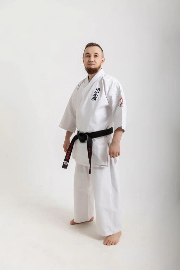 Санжар Кине